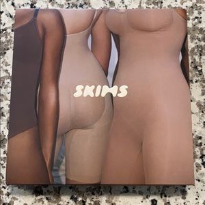 SKIMS Sculpting Bodysuit Mid Thigh